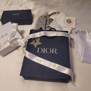 Dior Star Charm, Sticker, Small Gray bag, and  Accessories.
